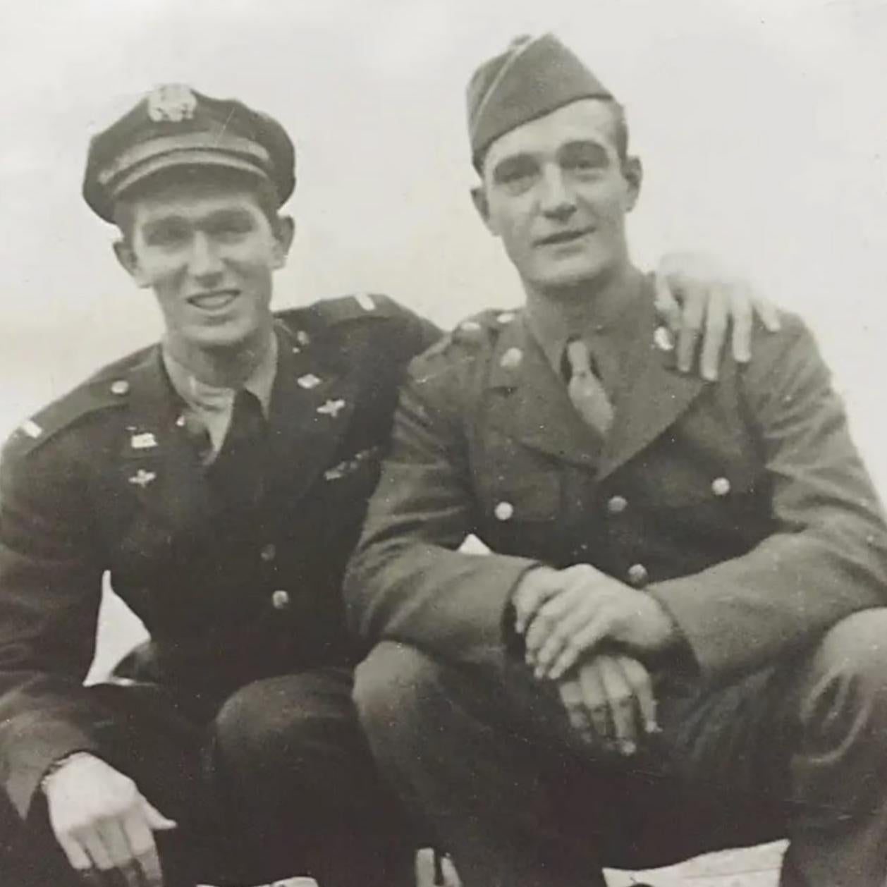 Army Tech. 5th Grade Joe Pinder Jr., right, poses for a photo with his brother, Hal, a first lieutenant and bomber pilot, at an airfield in England in 1943.